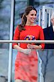 kate middleton shows tiny baby bump in red dress 12