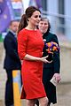 kate middleton shows tiny baby bump in red dress 17