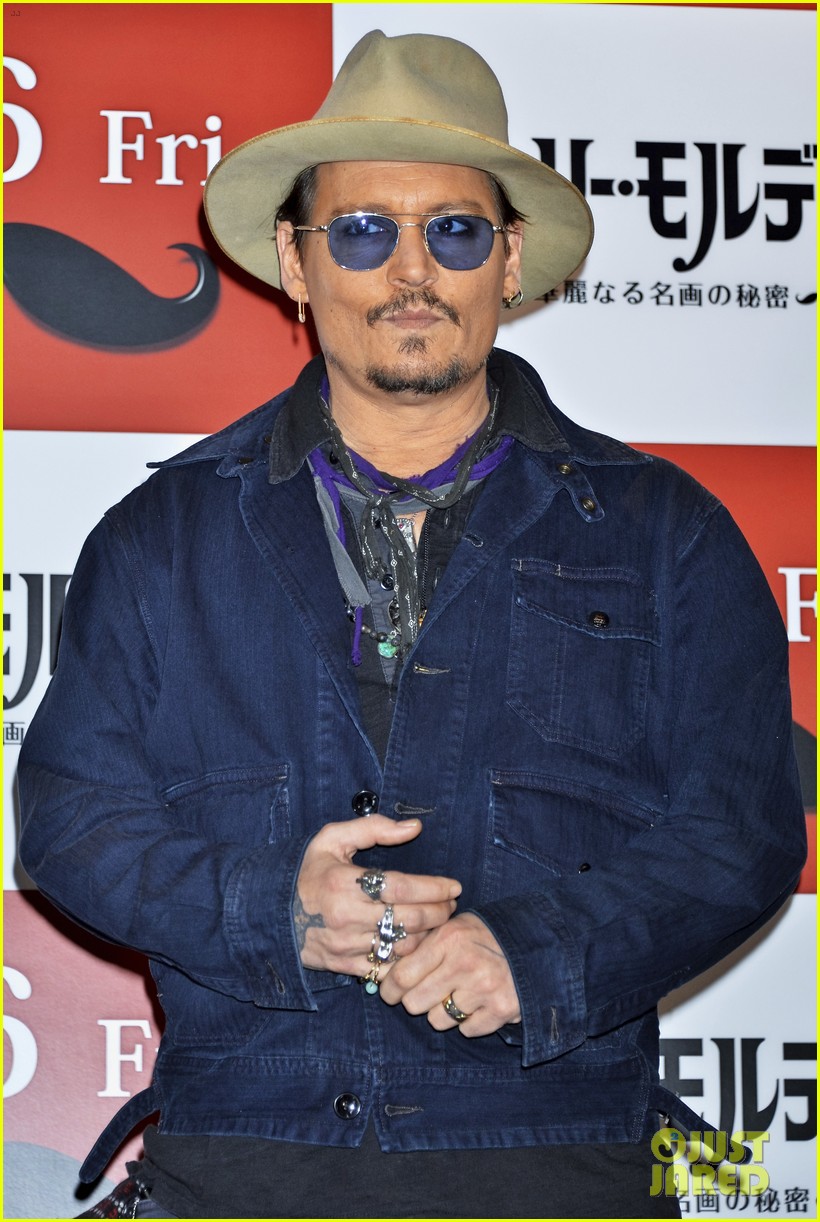 johnny depp hits tokyo for mortdecai press after getting support from fiance amber heard 113290355