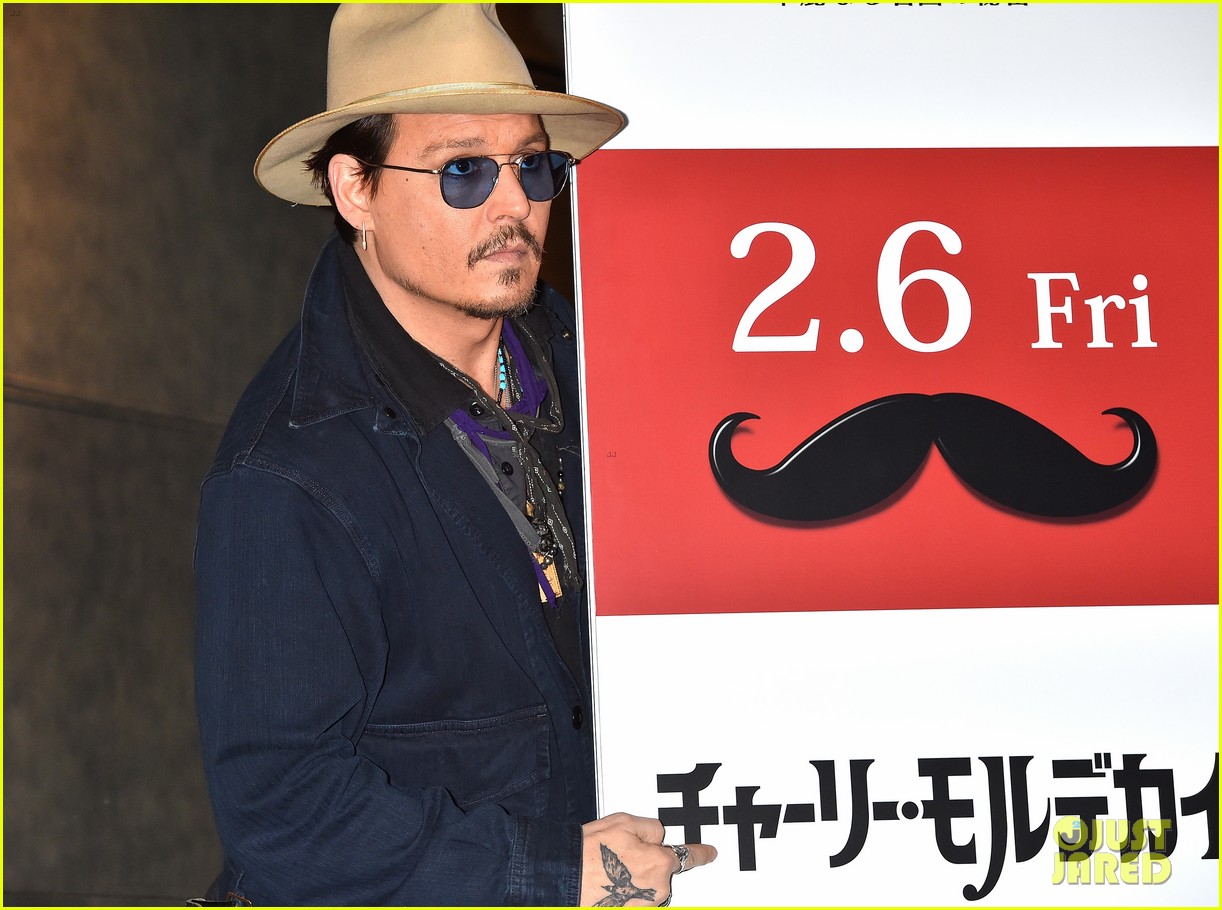 johnny depp hits tokyo for mortdecai press after getting support from fiance amber heard 143290358