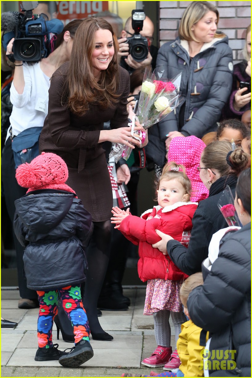 kate middleton steps out with growing baby bump to visit the fostering 033282241