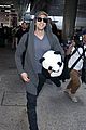 adrien brody travels around with his panda teddy bear 32