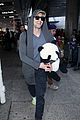 adrien brody travels around with his panda teddy bear 33