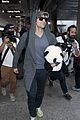 adrien brody travels around with his panda teddy bear 34