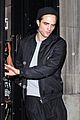 robert pattinson fka twigs hold hands at brit awards party 32