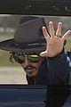 johnny depp leaves australia with injured hand taped up 02