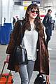 dakota johnson travels solo with her pet pooch by her side 04