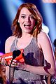 emma stone celebrates her win at the kcas 2015 04