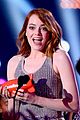 emma stone celebrates her win at the kcas 2015 06