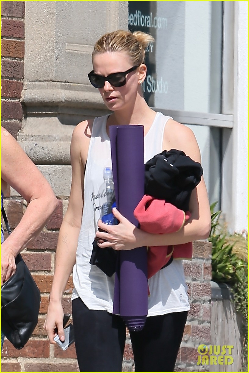 charlize theron yoga with a friend 033330678