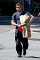 sam worthington steps out after baby news 01