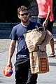 sam worthington steps out after baby news 02