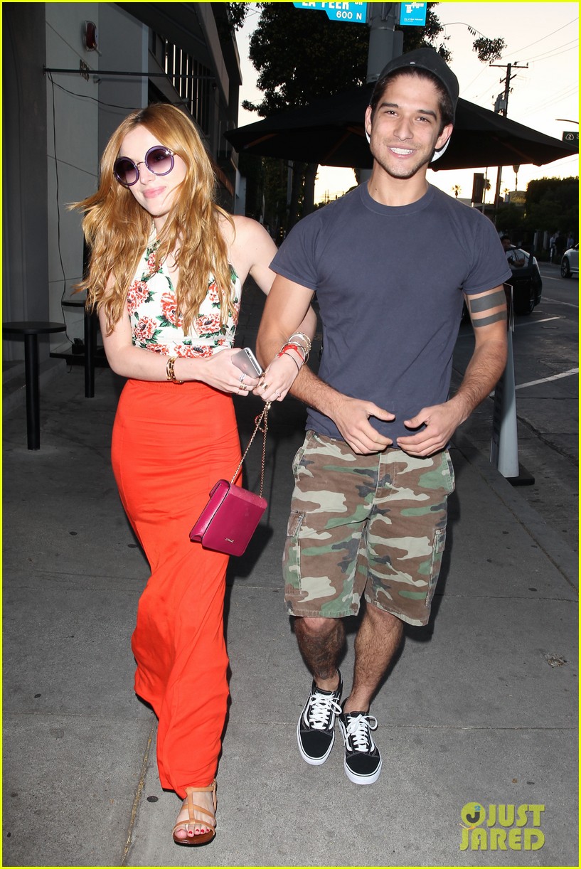 bella thorne tyler posey walk arm in arm together 19