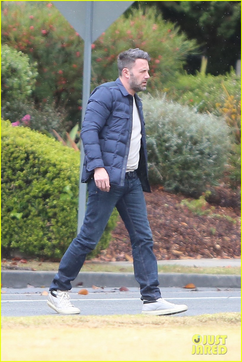 ben affleck heads to the office on friday rain 08