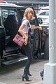 taylor swift wears crop top with overalls 12