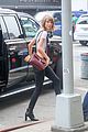 taylor swift wears crop top with overalls 14