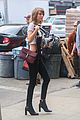 taylor swift wears crop top with overalls 15