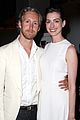 anne hathaway adam shulman coordinate their outfits at the true cost 06