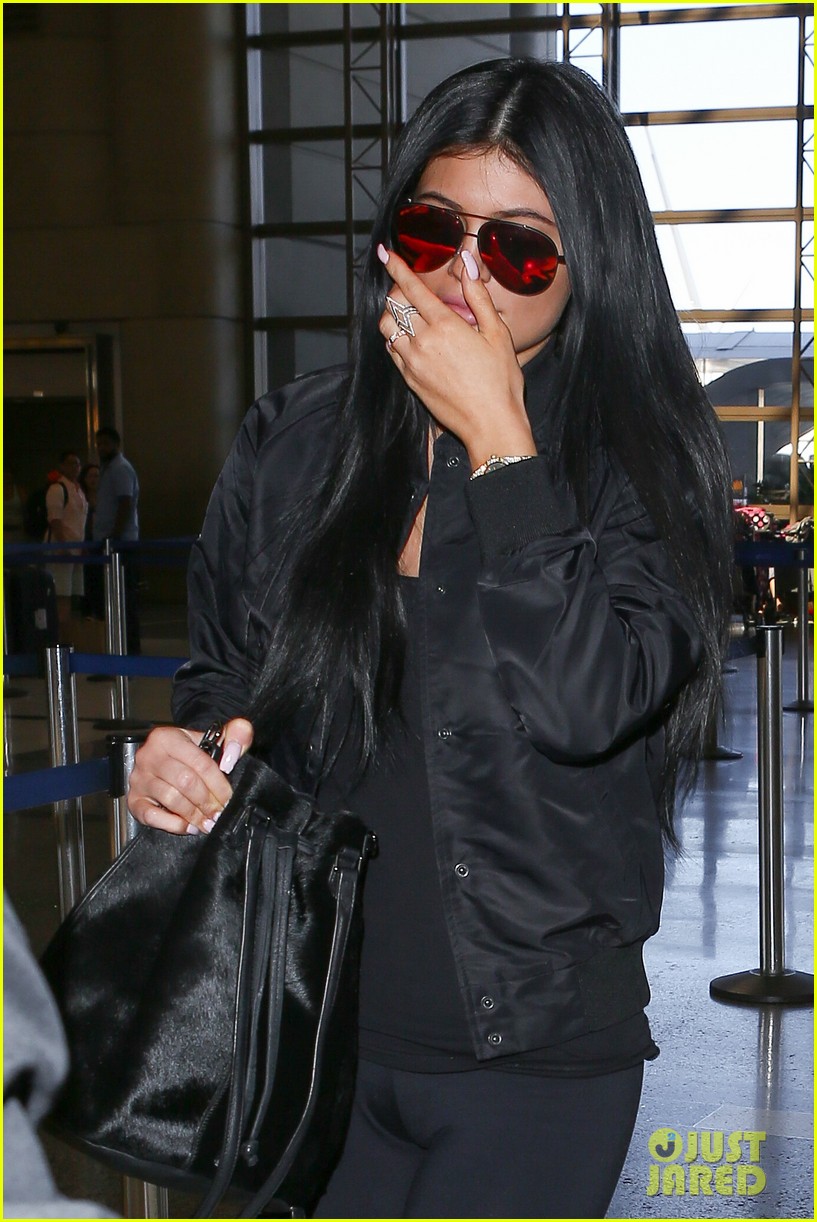 kylie jenner tyga wear matching black at lax airport 153400184