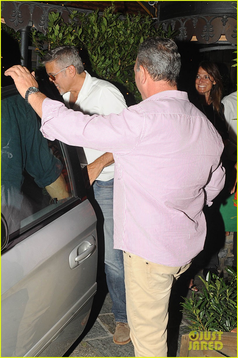& Amal Clooney Enjoy Dinner Date in Lake Como with Friends