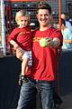 michael buble throws out first pitch with cutie son noah 21
