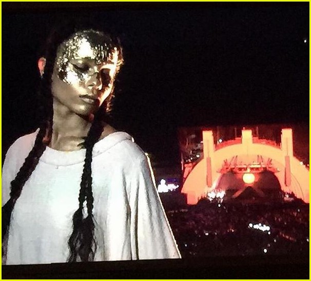 Khloe Kardashian & North West Share Cute Kiss at Kanye Show Photo