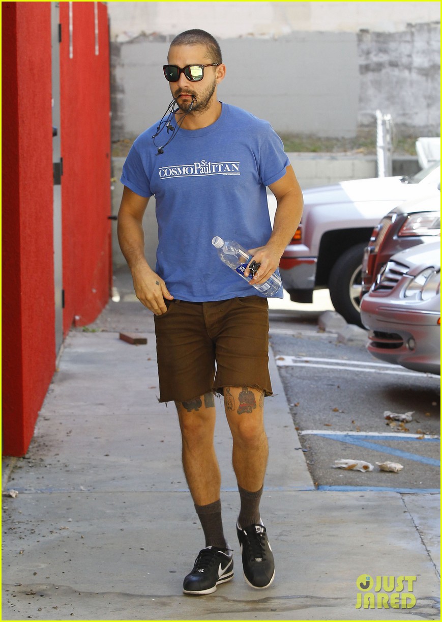 shia labeouf carries headphones in mouth 173470192