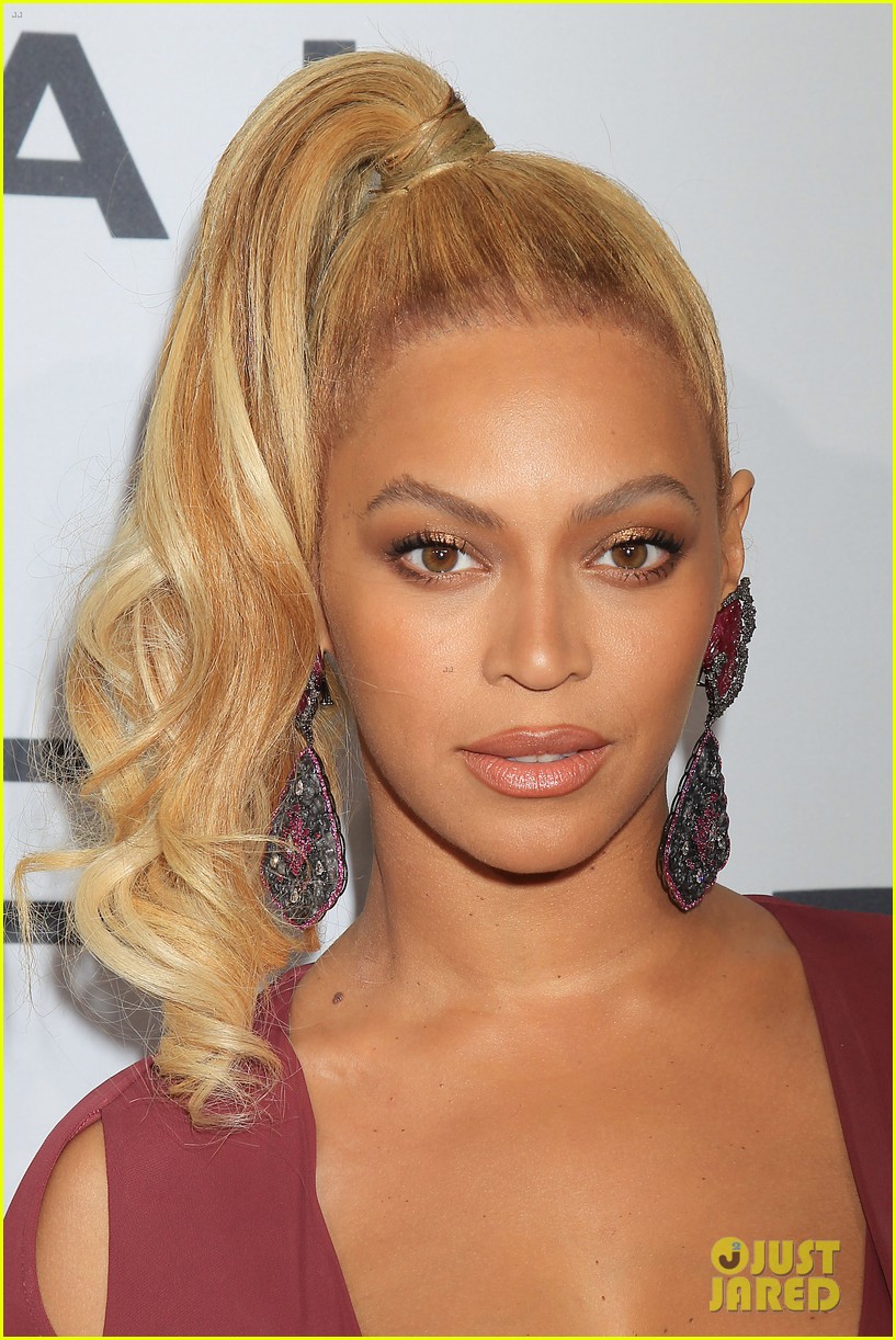 beyonce flaunts cleavage in sexy dress at tidal concert 22