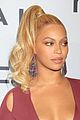 beyonce flaunts cleavage in sexy dress at tidal concert 15