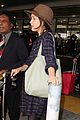 rose byrne covers baby bump in loose fitting shirt 02