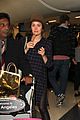 rose byrne covers baby bump in loose fitting shirt 04