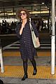 rose byrne covers baby bump in loose fitting shirt 12