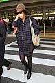 rose byrne covers baby bump in loose fitting shirt 19