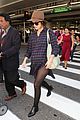 rose byrne covers baby bump in loose fitting shirt 20