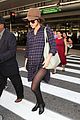 rose byrne covers baby bump in loose fitting shirt 21