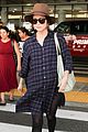 rose byrne covers baby bump in loose fitting shirt 24