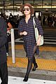 rose byrne covers baby bump in loose fitting shirt 25