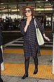 rose byrne covers baby bump in loose fitting shirt 26