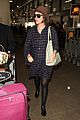 rose byrne covers baby bump in loose fitting shirt 29
