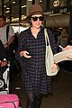 rose byrne covers baby bump in loose fitting shirt 30
