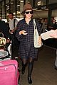 rose byrne covers baby bump in loose fitting shirt 31