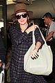 rose byrne covers baby bump in loose fitting shirt 32
