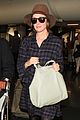 rose byrne covers baby bump in loose fitting shirt 33