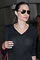 angelina jolie touches down in los angeles with four of her kids 02