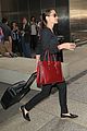 angelina jolie touches down in los angeles with four of her kids 03