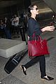 angelina jolie touches down in los angeles with four of her kids 05