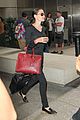 angelina jolie touches down in los angeles with four of her kids 06