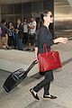 angelina jolie touches down in los angeles with four of her kids 08