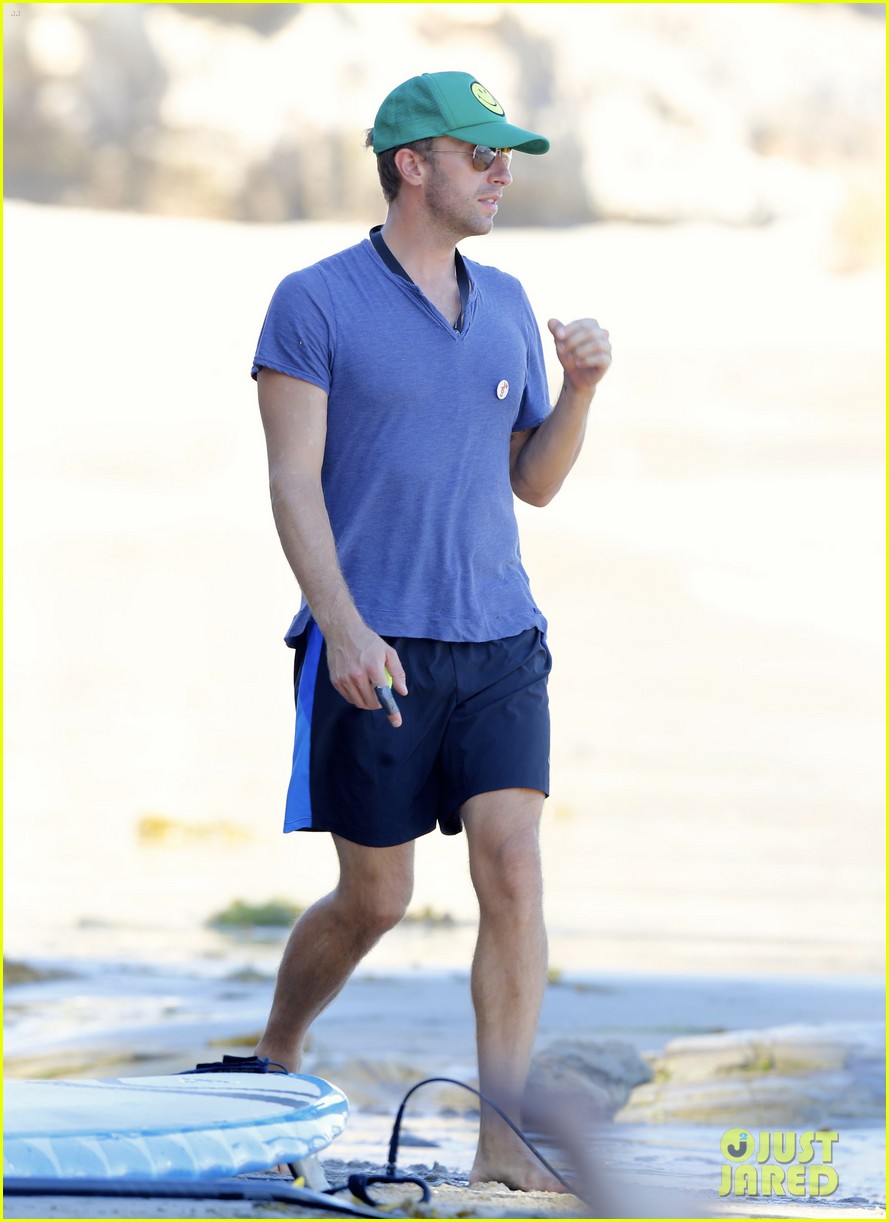 chris martin has a beach day with son moses 063481800