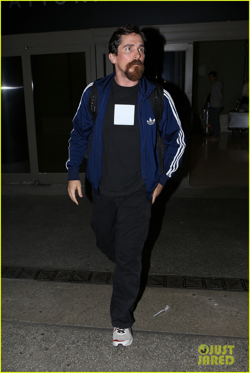 christian bale lands at lax airport 113506304